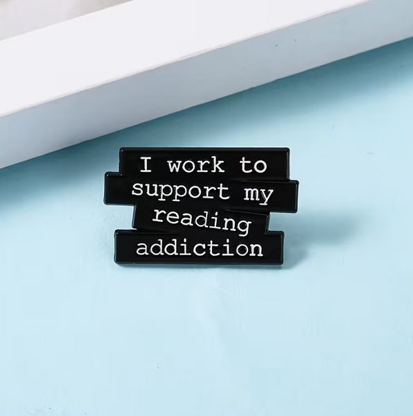 Пін-значок "I work to support my reading addiction" px-01143 фото